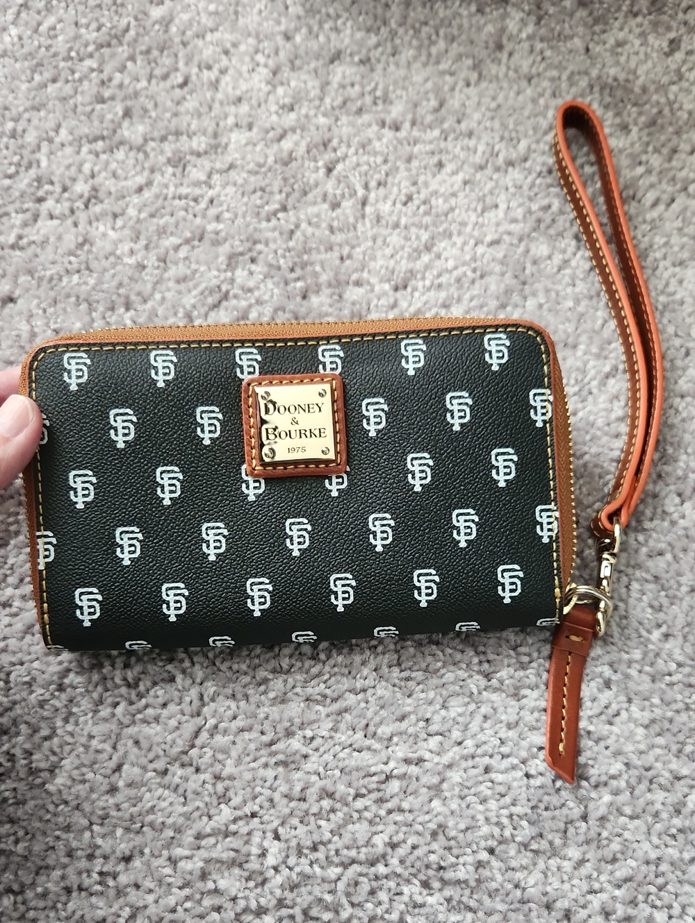 Dooney & Bourke Black Logo Wristlet with Brown Trim and Strap